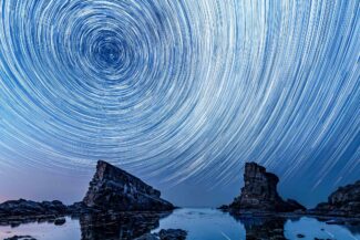 Star trails over the rock phenomenon The Ships (Bulgaria)